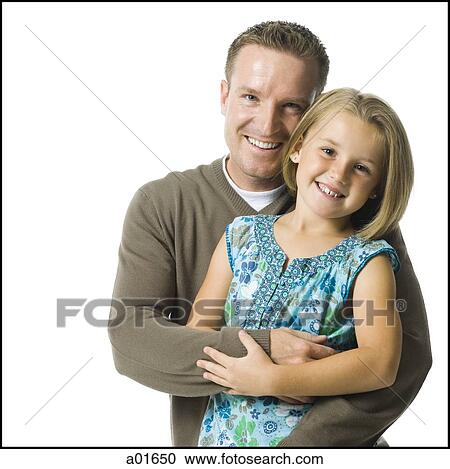 Stock Image - Father and young daughter.. Fotosearch
