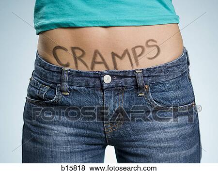 Female Abdomen with CRAMPS written on it View Large Photo Image Stock Photo - Female Abdomen with CRAMPS written on it. Fotosearch