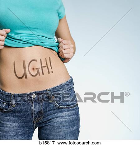 Female Abdomen with UGH! written on it View Large Photo Image Stock Photo - Female Abdomen with UGH! written on it. Fotosearch
