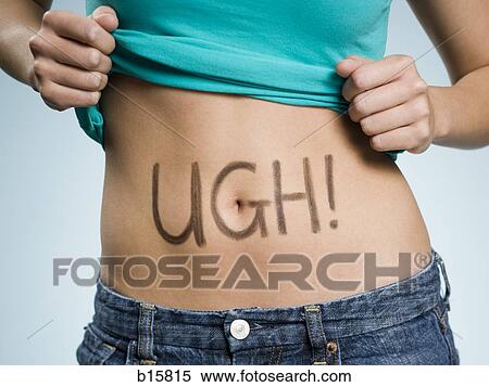 Stock Photography - Female Abdomen with UGH! written on it. Fotosearch