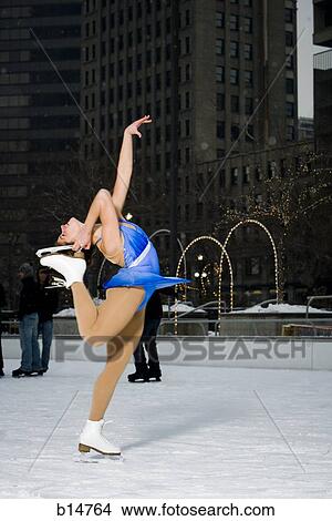 Female figure skater outdoors View Large Photo Image Picture - Female figure skater outdoors. Fotosearch