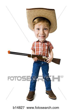 Fotokarikatur Von Junge Mit Cowboyhut Und Spielzeug Gewehr Stock Foto B14827 Fotosearch