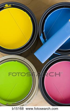 Four paint cans and stir stick from above View Large Photo Image Stock Photo - Four paint cans and stir stick from above. Fotosearch