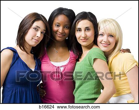 Picture - Four women hugging and smiling. Fotosearch