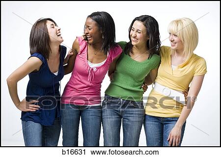 Four women hugging and smiling View Large Photo Image Stock Image - Four women hugging and smiling. Fotosearch