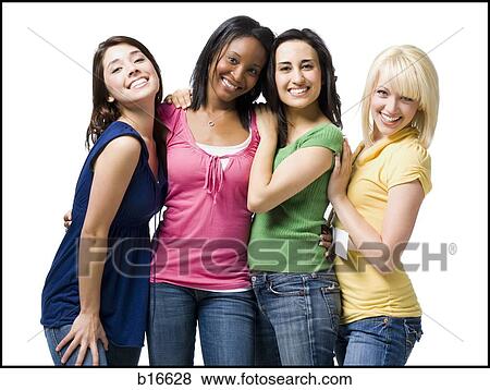 Four women hugging and smiling View Large Photo Image Stock Photo - Four women hugging and smiling. Fotosearch