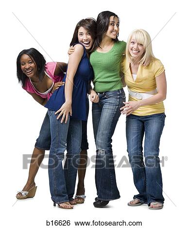 Stock Photograph - Four women hugging and smiling. Fotosearch