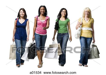 Four women walking and smiling with shopping bags View Large Photo Image Picture - Four women walking and smiling with shopping bags. Fotosearch