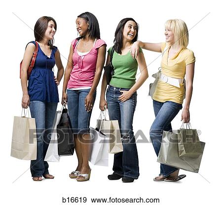 Stock Photo - Four women with shopping bags smiling. Fotosearch