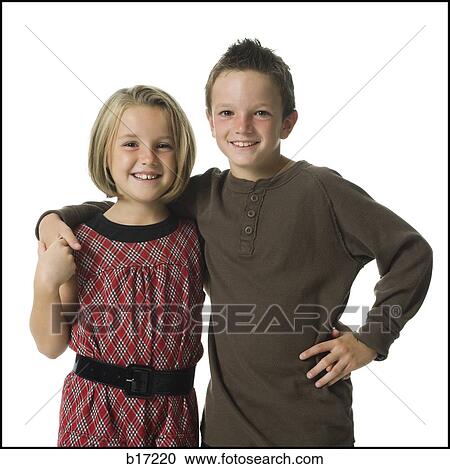 Girl and boy embracing and smiling View Large Photo Image Stock Image - Girl and boy embracing and smiling. Fotosearch