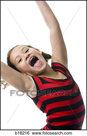 Stock Photograph - Girl dancing and smiling. Fotosearch