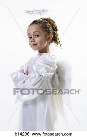 Girl dressed as an angel View Large Photo Image Stock Photograph - Girl dressed as an angel. Fotosearch