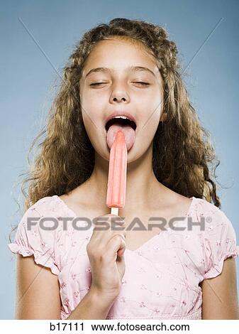Girl eating Popsicle View Large Photo Image Stock Image - Girl eating Popsicle. Fotosearch