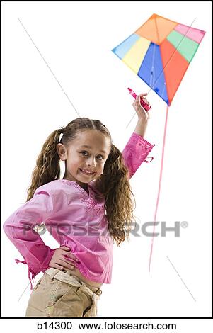 Girl flying kite View Large Photo Image Stock Image - Girl flying kite. Fotosearch
