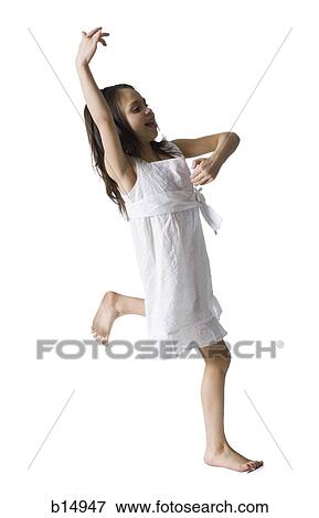 Girl in white dress dancing View Large Photo Image Stock Photo - Girl in white dress dancing. Fotosearch