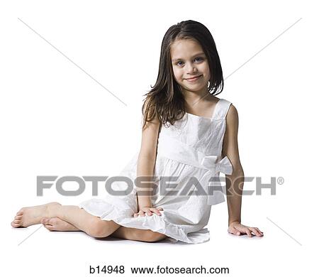 Girl in white dress smiling View Large Photo Image Stock Photo - Girl in white dress smiling. Fotosearch