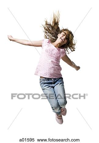 Girl jumping and smiling View Large Photo Image Stock Photography - Girl jumping and smiling. Fotosearch