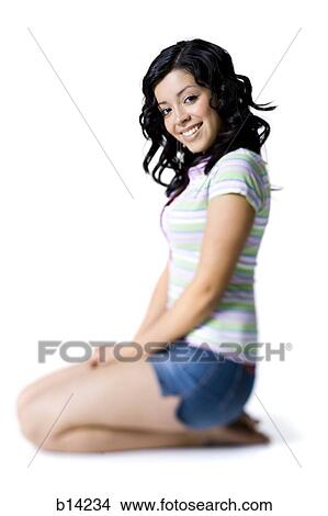 Girl kneeling View Large Photo Image Picture - Girl kneeling. Fotosearch
