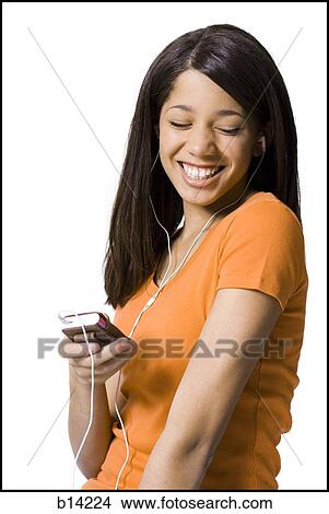 Girl listening to mp3 player View Large Photo Image Picture - Girl listening to mp3 player. Fotosearch