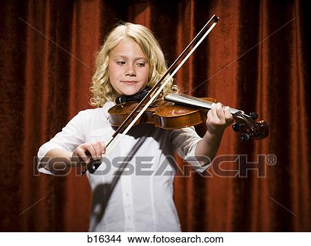 Girl playing violin on stage View Large Photo Image Picture - Girl playing violin on stage. Fotosearch