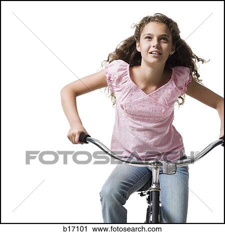 Girl riding bicycle looking up View Large Photo Image Stock Image - Girl riding bicycle looking up. Fotosearch