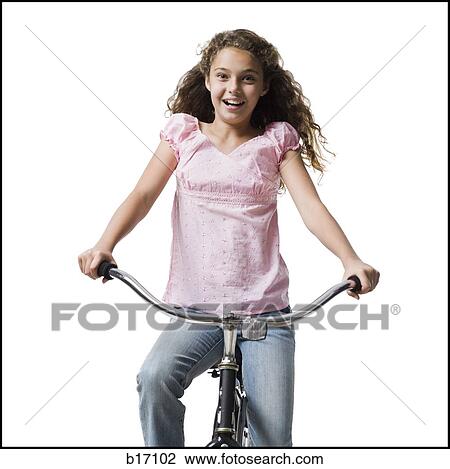 Girl riding bicycle smiling View Large Photo Image Stock Image - Girl riding bicycle smiling. Fotosearch