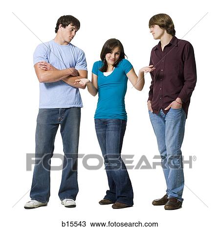 Girl shrugging between two boys View Large Photo Image Stock Image - Girl shrugging between two boys. Fotosearch