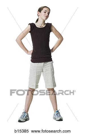 Girl standing with hands on hips View Large Photo Image Stock Photography - Girl standing with hands on hips. Fotosearch