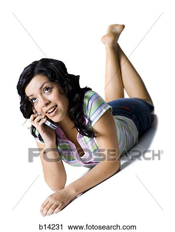 Girl talking on cell phone View Large Photo Image Stock Image - Girl talking on cell phone. Fotosearch