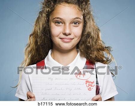 Girl with A plus paper smiling View Large Photo Image Stock Photography - Girl with A plus paper smiling. Fotosearch