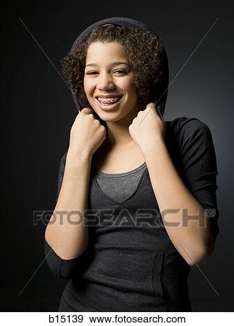 Girl with braces smiling View Large Photo Image Stock Photo - Girl with braces smiling. Fotosearch