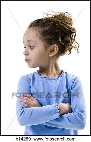 Stock Photo - Girl with folded arms. Fotosearch