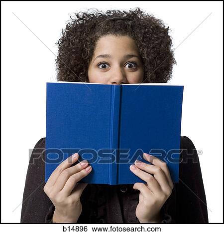 Girl with hardcover book View Large Photo Image Stock Photograph - Girl with hardcover book. Fotosearch