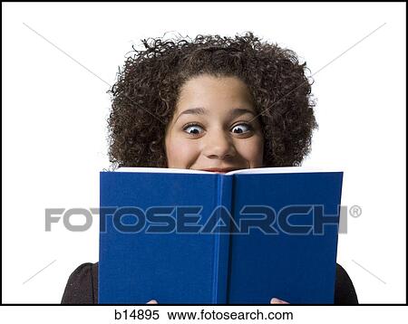Stock Photography - Girl with hardcover book. Fotosearch