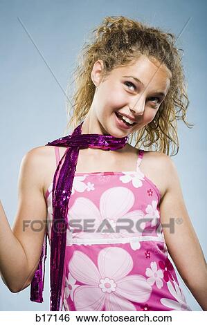 Girl with lipstick smiling and posing View Large Photo Image Stock Photograph - Girl with lipstick smiling and posing. Fotosearch