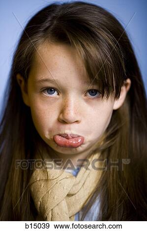 Girl with scarf pouting View Large Photo Image Stock Photo - Girl with scarf pouting. Fotosearch