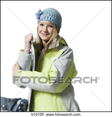 Girl with winter hat and skis smiling View Large Photo Image Stock Image - Girl with winter hat and skis smiling. Fotosearch