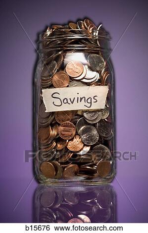 Glass jar with Savings label and coins View Large Photo Image Stock Photograph - Glass jar with Savings label and coins. Fotosearch