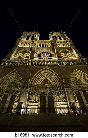 Ground level view of cathedral at night View Large Photo Image Stock Image - Ground level view of cathedral at night. Fotosearch