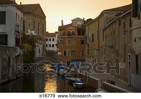 Historic Buildings and canal with boats View Large Photo Image Stock Photo - Historic Buildings and canal with boats. Fotosearch