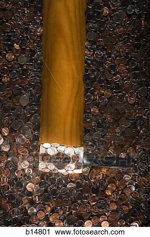 Lint roller picking up loose change View Large Photo Image Stock Image - Lint roller picking up loose change. Fotosearch