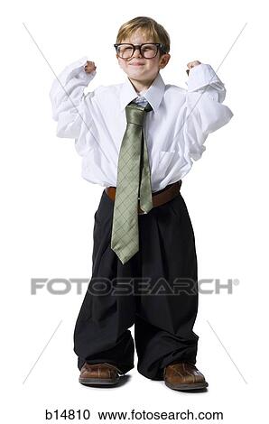 Stock Image - Little boy dressed as business executive. Fotosearch