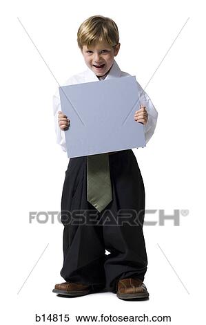 Little boy dressed as business executive with blank sign View Large Photo Image Stock Photography - Little boy dressed as business executive with blank sign. Fotosearch