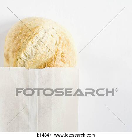 Loaf of bread in paper bag View Large Photo Image Stock Photo - Loaf of bread in paper bag. Fotosearch