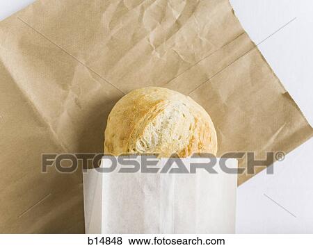 Loaf of bread in paper bag View Large Photo Image Stock Photo - Loaf of bread in paper bag. Fotosearch