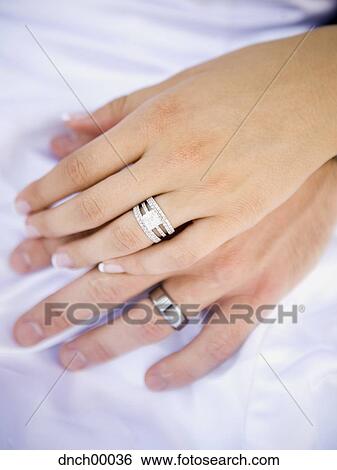Stock Images Of Male And Female Hands With Wedding Rings Dnch00036 Male And Female Hands With Wedding Rings
