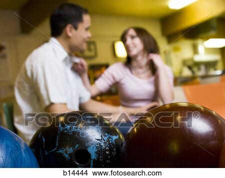 Picture - Man and woman bowling. Fotosearch