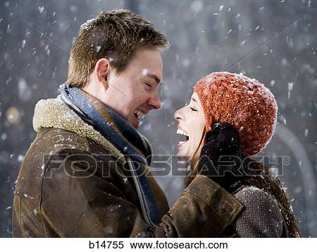 Man and woman outdoors in winter smiling View Large Photo Image Stock Photography - Man and woman outdoors in winter smiling. Fotosearch