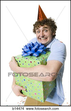 Man celebrating birthday View Large Photo Image Picture - Man celebrating birthday. Fotosearch