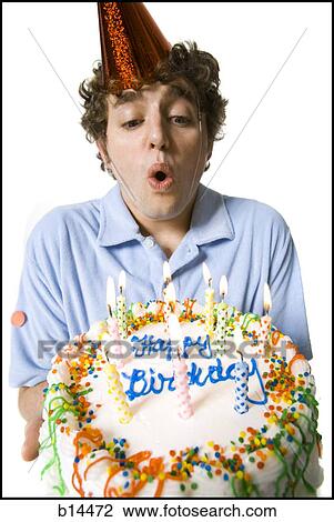 Stock Image - Man celebrating birthday. Fotosearch